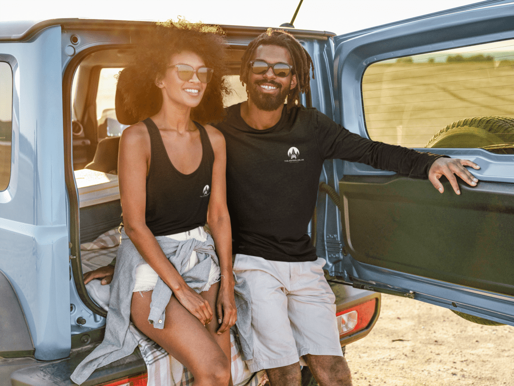 long sleeve tee and tank top mockup of an adventurous couple in the back of a truck 45677 r el2